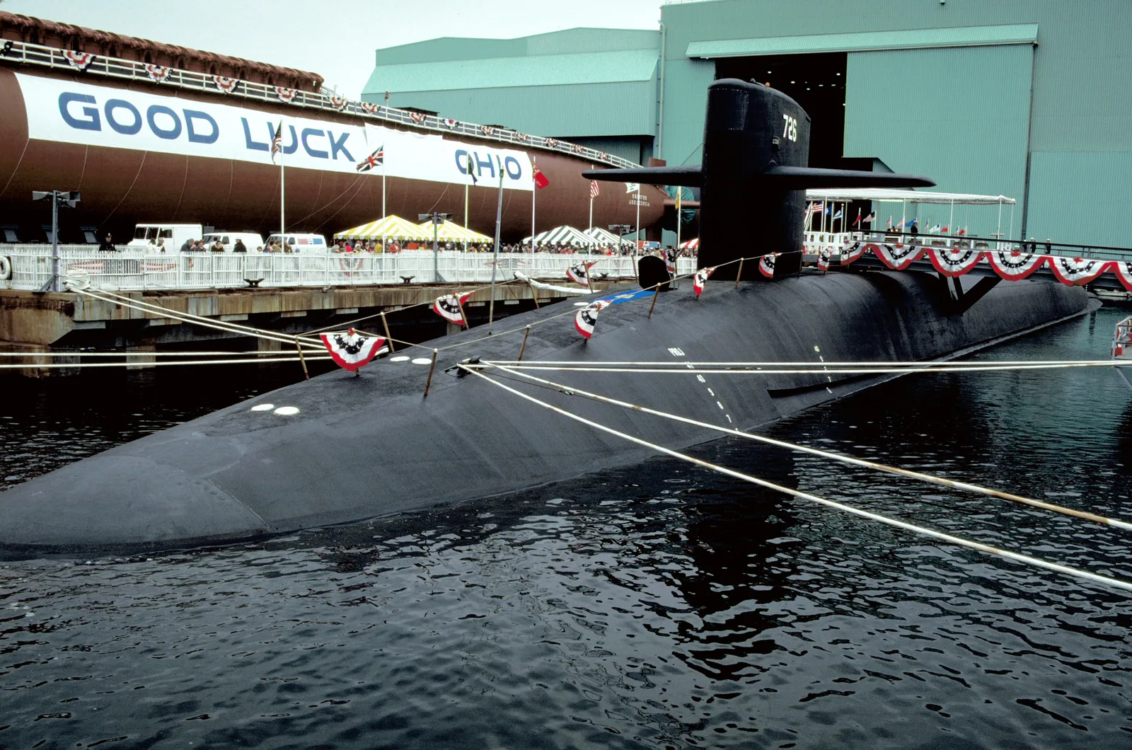 An Ohio-class ballistic missile submarine surfaced, full length visible.