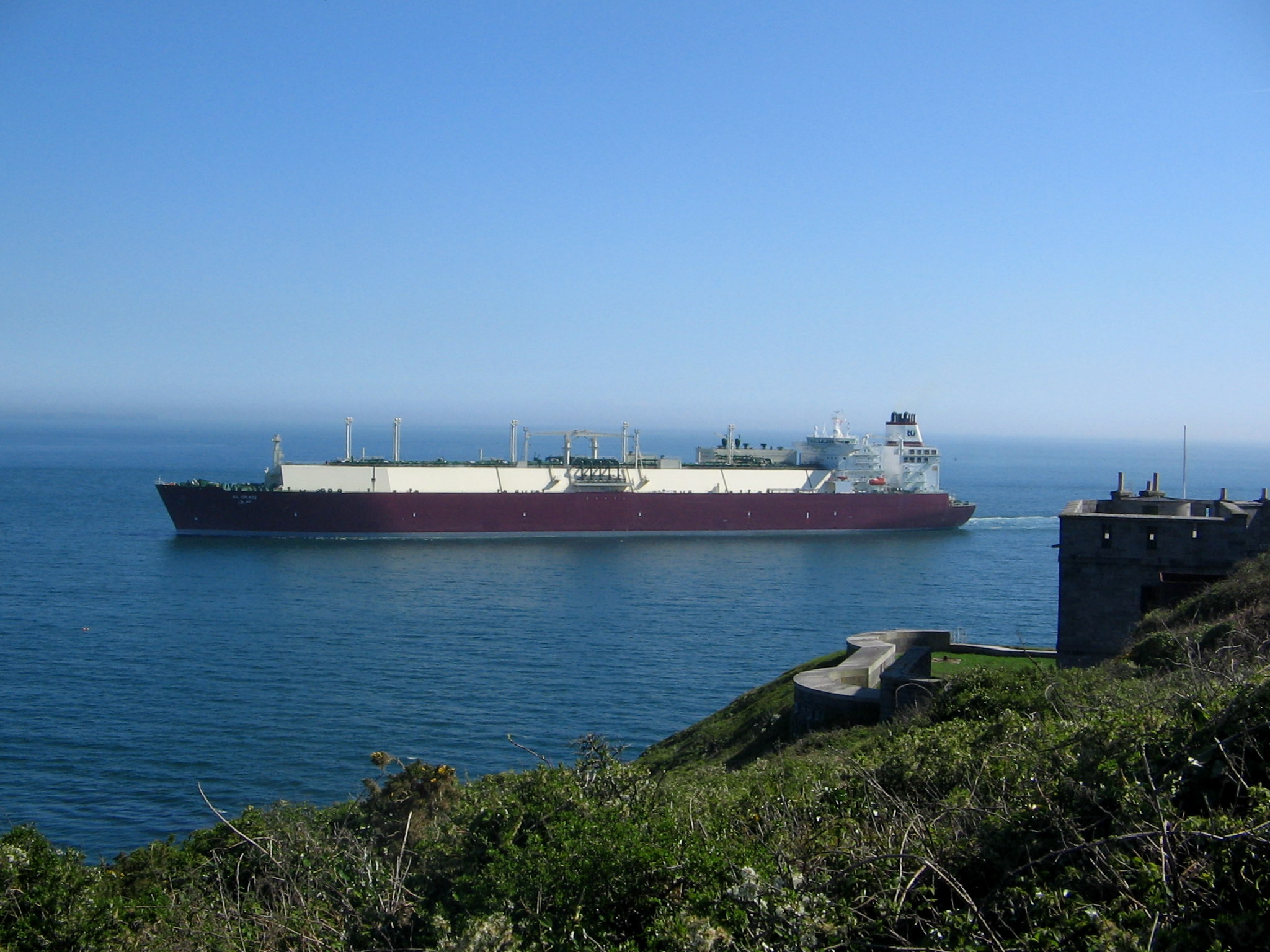 A Q-Flex-class LNG carrier transiting near the Welsh coast