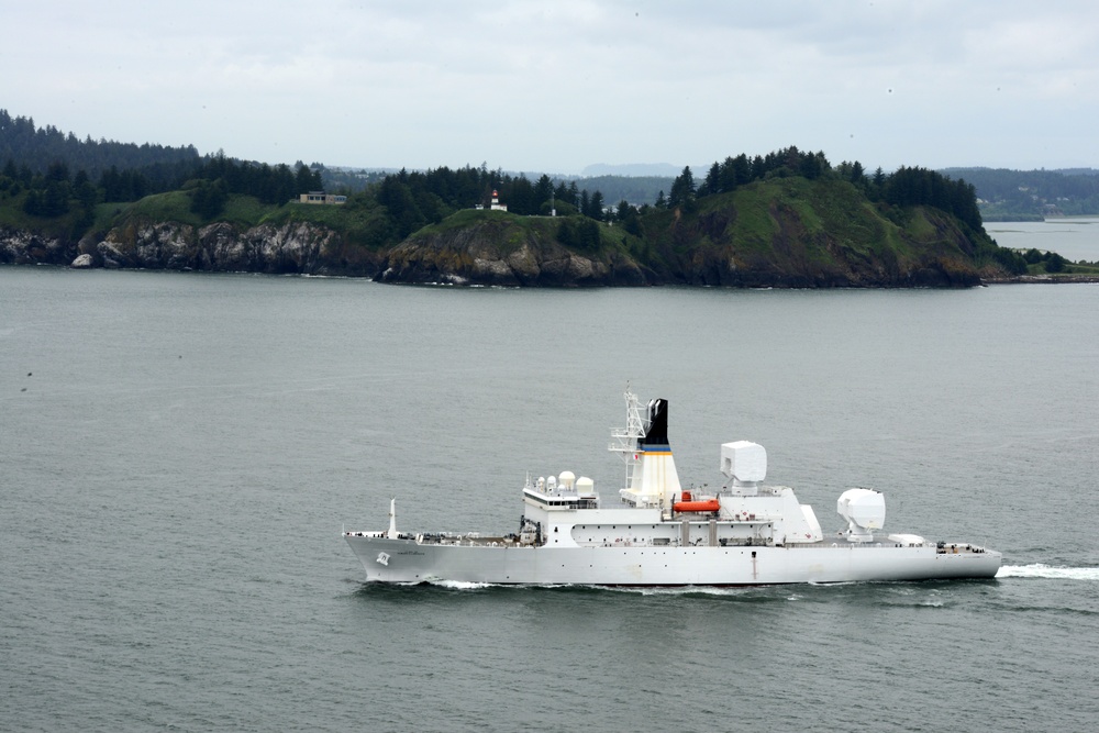USNS Howard O. Lorenzen, a currently serving Missile Range Instrumentation Ship, departing the Columbia River, an existing vessel of the same mission type as the new ships being built, not the new vessel itself