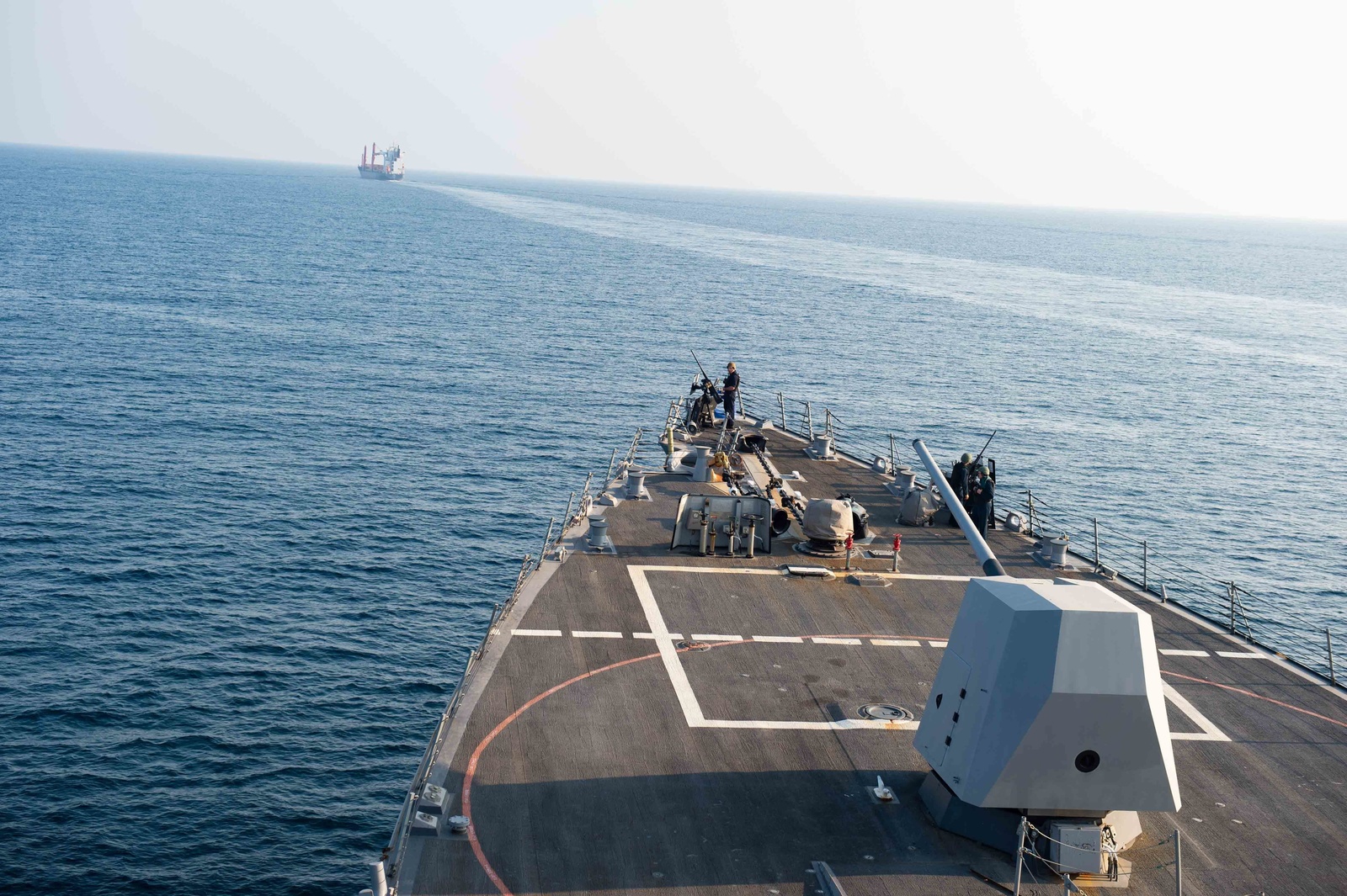 The guided-missile destroyer USS Farragut escorts a U.S.-flagged merchant vessel through the Bab al-Mandeb strait, an older file photo illustrating the strait