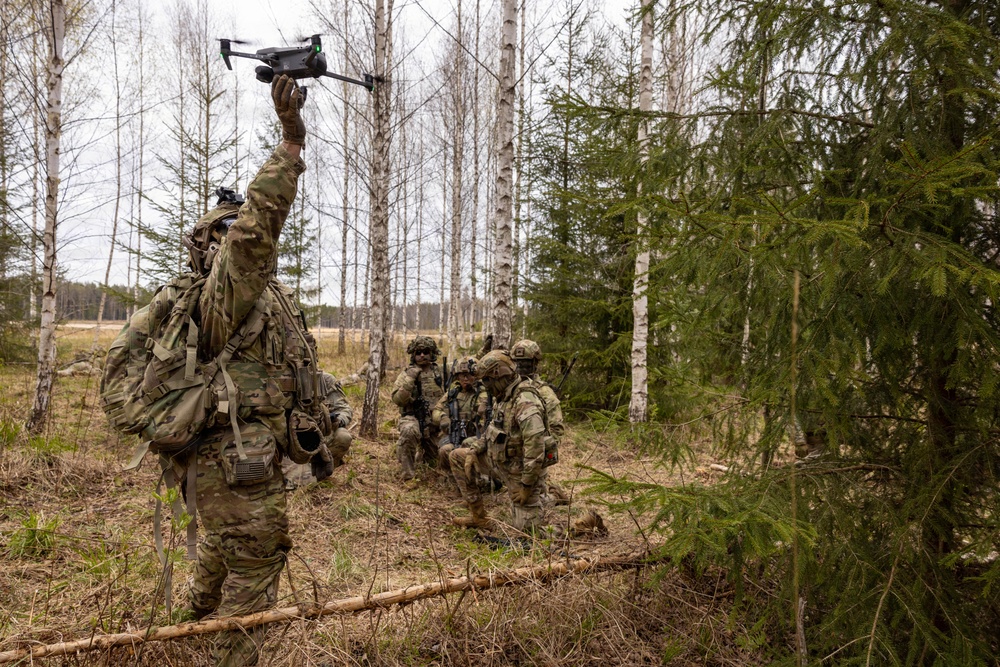 U.S. Army soldiers operating a DJI Mavic 3 drone during a live-fire exercise in Latvia