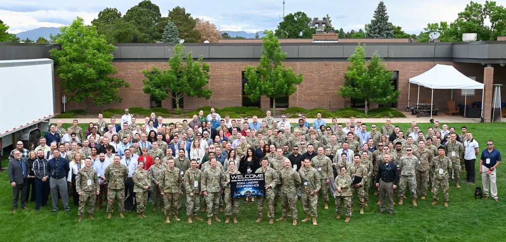 Group photo of attendees at the National Space Test and Training Complex Users' Conference at Peterson Space Force Base