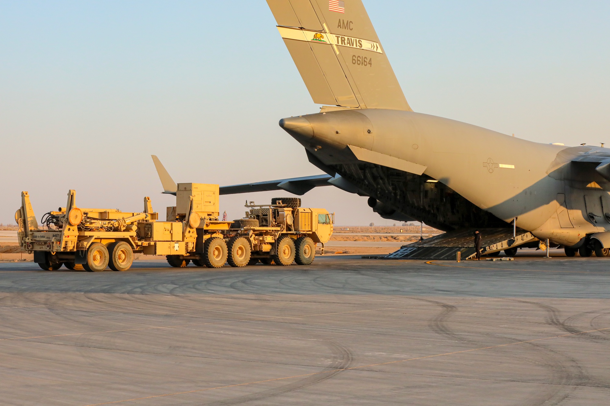 U.S. Army soldiers load Patriot missile system equipment onto a C-17 Globemaster III
