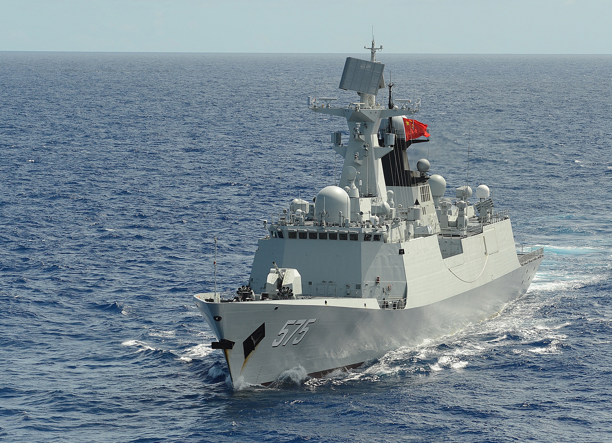 PLA(N) Type 054A frigate Yueyang (FF 575) steams in formation with allied warships during RIMPAC 2014